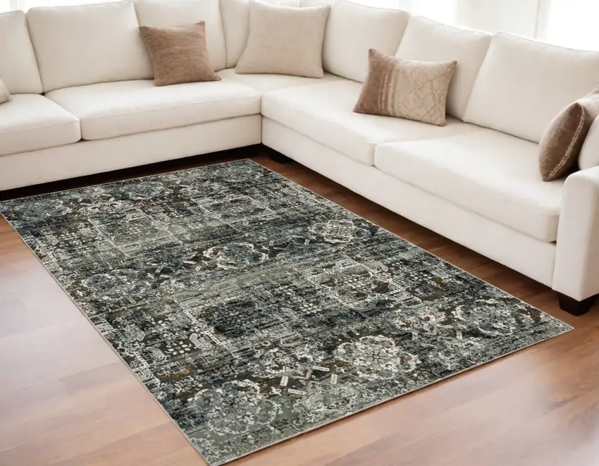 Ivory and Black Oriental Power Loom Area Rug Photo 1