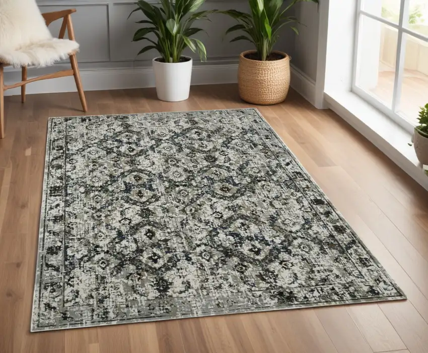 Ivory and Black Oriental Power Loom Area Rug Photo 1
