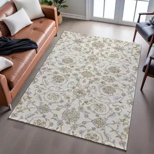 Photo of Ivory Copper And Gray Moroccan Washable Area Rug With UV Protection