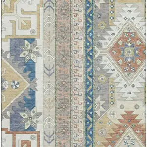 Photo of Ivory Copper And Teal Southwestern Washable Area Rug With UV Protection