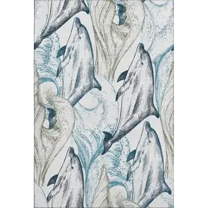 Photo of Ivory Denim Blue And Taupe Nautical Washable Area Rug With UV Protection