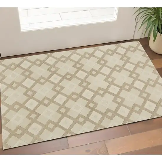 Ivory And Brown Wool Geometric Hand Tufted Area Rug Photo 1