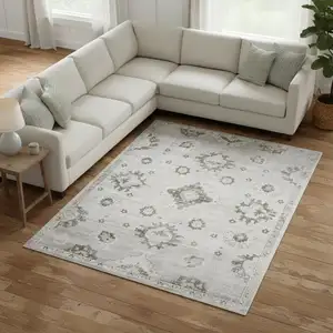 Photo of Ivory Floral Distressed Area Rug