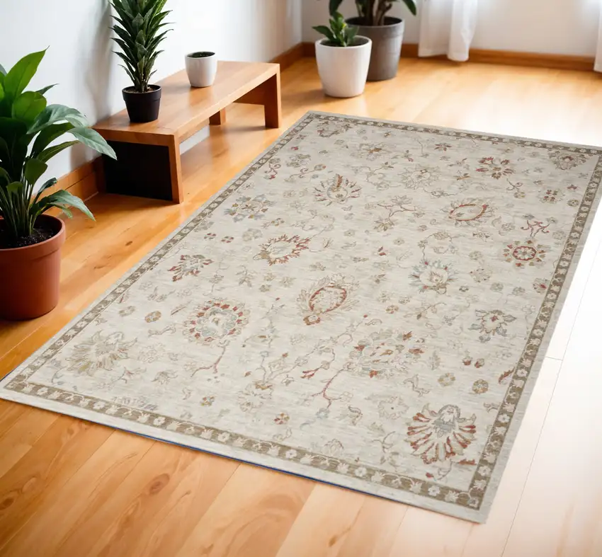 Ivory Floral Power Loom Distressed Area Rug Photo 1