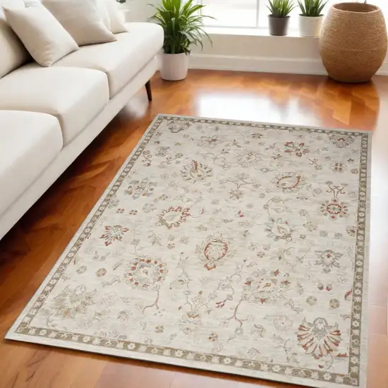 Ivory Floral Power Loom Distressed Area Rug Photo 1