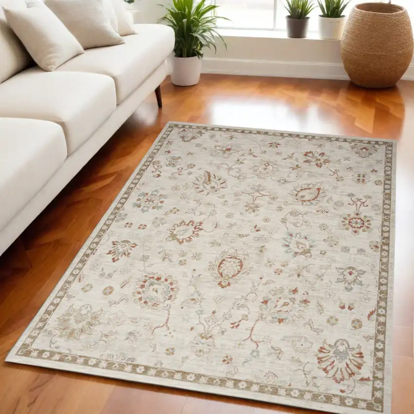 Ivory Floral Power Loom Distressed Area Rug Photo 1