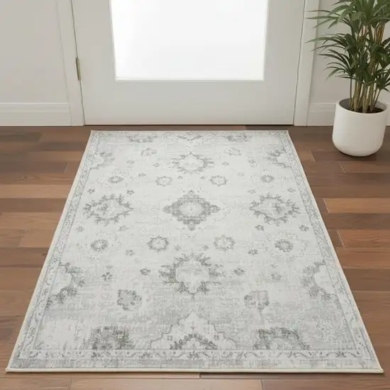 Ivory Floral Power Loom Worn Faded Area Rug Photo 1