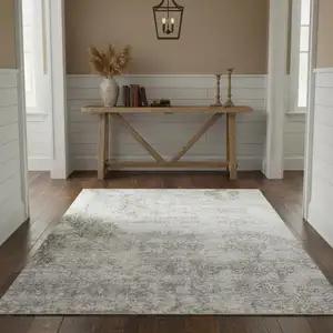 Photo of Ivory Floral Power Loom Worn Faded Area Rug