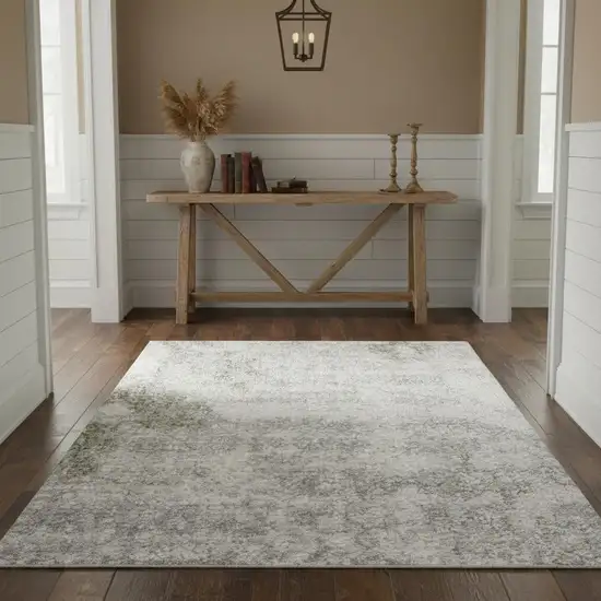 Ivory Floral Power Loom Worn Faded Area Rug Photo 1