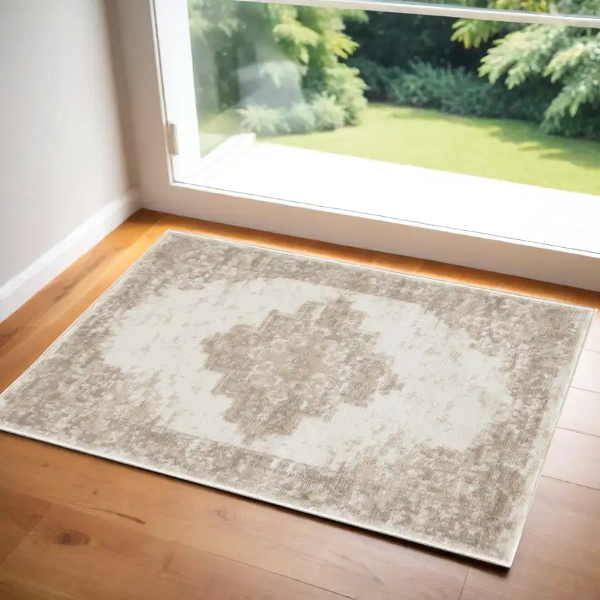 Ivory Floral Power Loom Worn Faded Area Rug Photo 1
