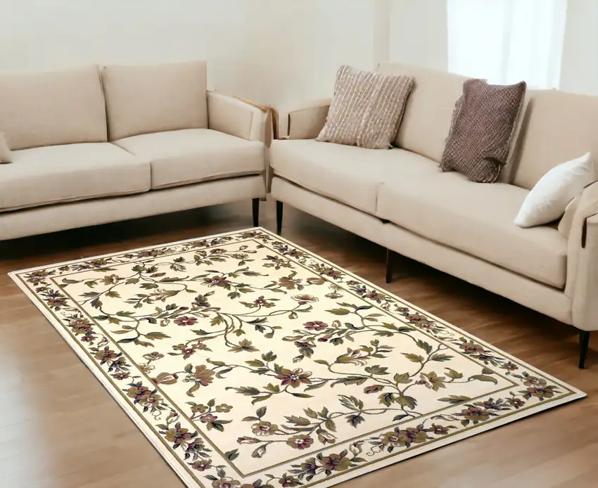 Ivory Floral Vine Bordered Area Rug Photo 1