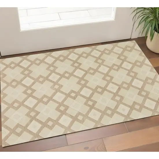 Ivory And Brown Wool Geometric Hand Tufted Area Rug Photo 1