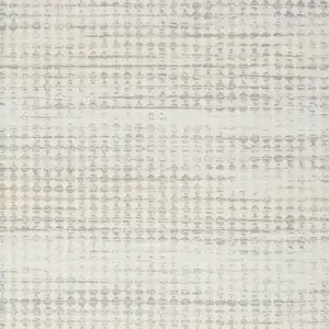 Photo of Ivory Geometric Distressed Area Rug
