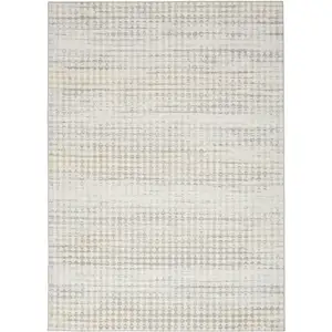 Photo of Ivory Geometric Distressed Area Rug