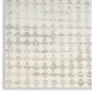 Photo of Ivory Geometric Distressed Area Rug
