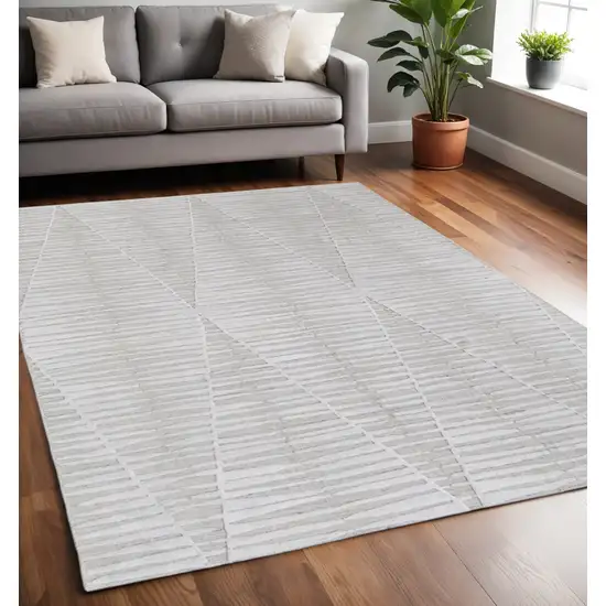Ivory And Tan Geometric Hand Woven Area Rug Photo 1