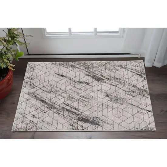Ivory And Brown Geometric Area Rug Photo 1