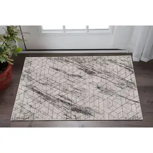 Photo of Ivory Geometric Pattern Area Rug