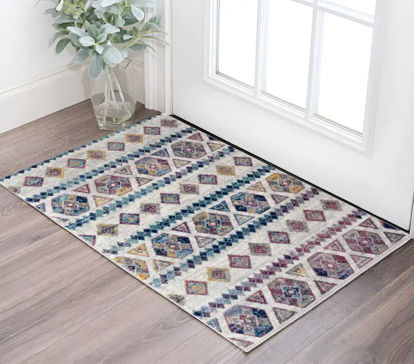 Ivory Blue and Orange Geometric Power Loom Area Rug Photo 1