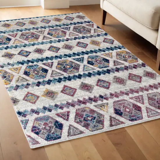 Ivory Blue and Orange Geometric Power Loom Area Rug Photo 1