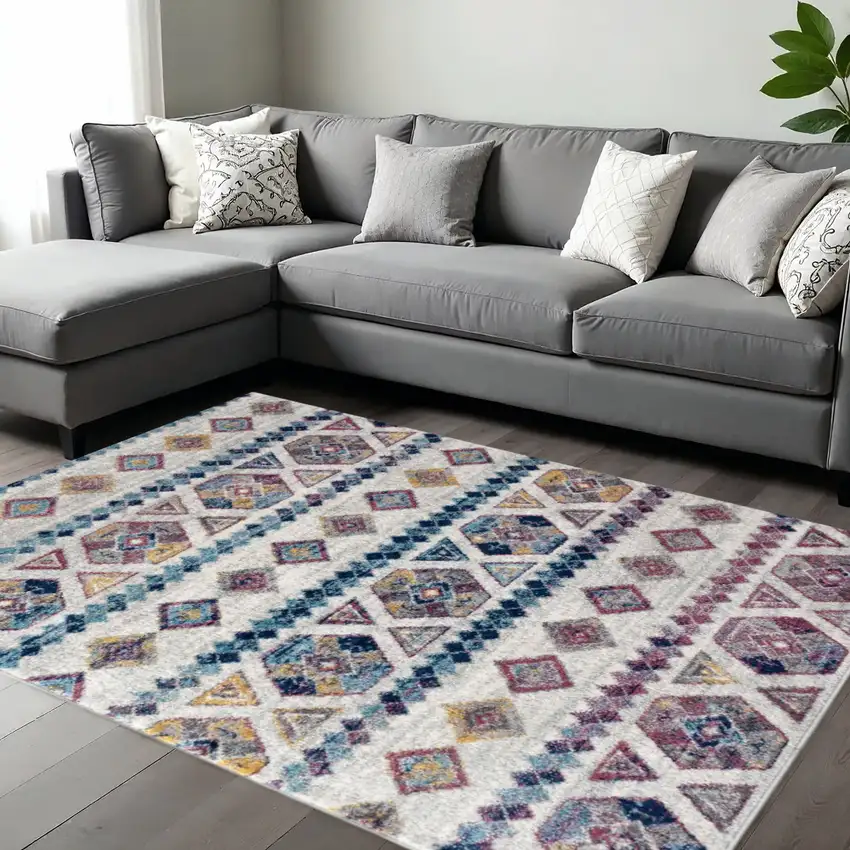 Ivory Blue And Orange Geometric Area Rug Photo 1