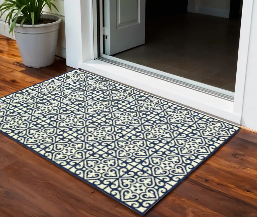 Ivory and Blue Geometric Stain Resistant Indoor Outdoor Area Rug Photo 1