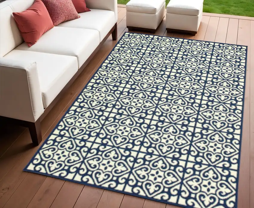 Ivory and Blue Geometric Stain Resistant Indoor Outdoor Area Rug Photo 1