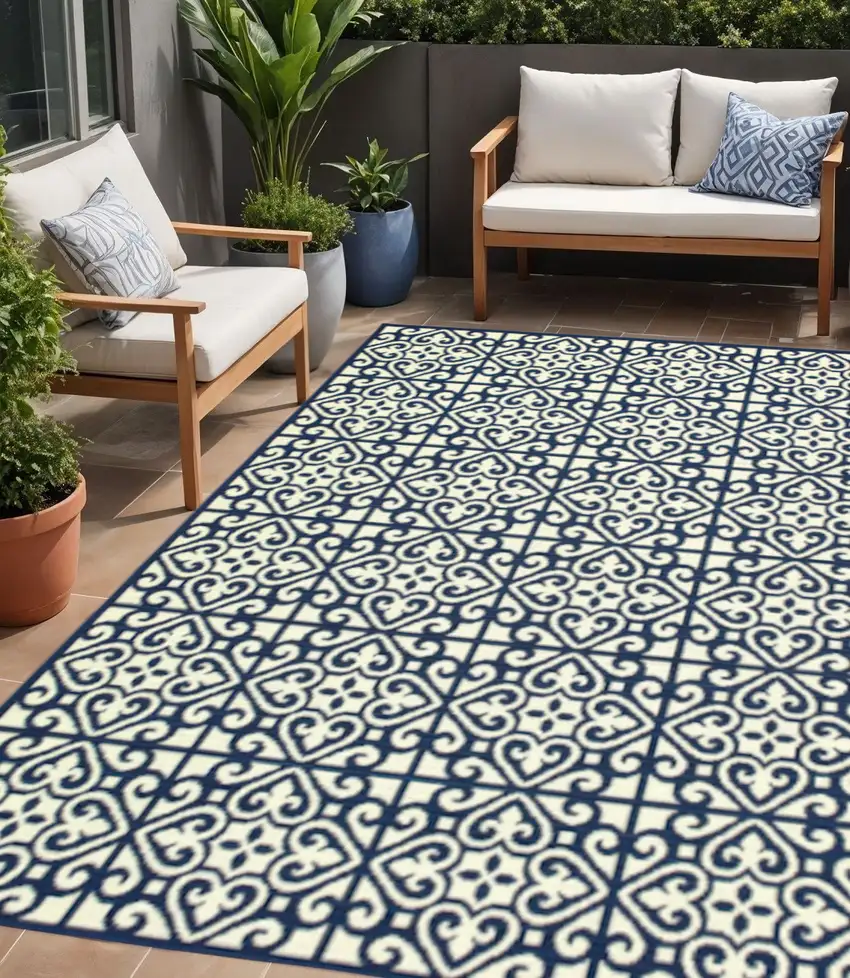 Ivory and Blue Geometric Stain Resistant Indoor Outdoor Area Rug Photo 1
