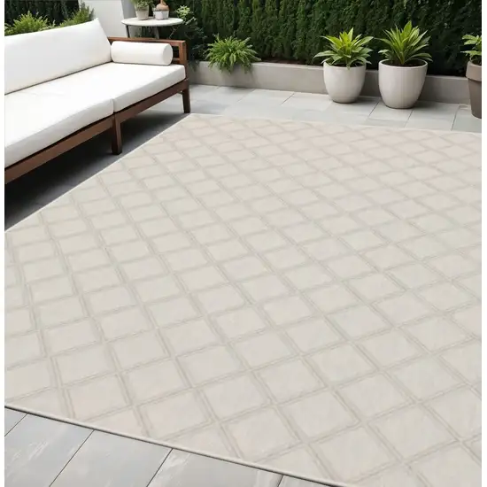 Gray and Ivory Geometric Stain Resistant Indoor Outdoor Area Rug Photo 1