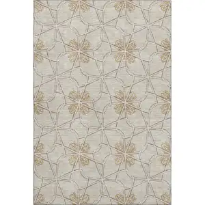 Photo of Ivory Gold And Beige Geometric Washable Area Rug With UV Protection