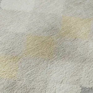 Photo of Ivory Gold And Beige Geometric Washable Area Rug With UV Protection