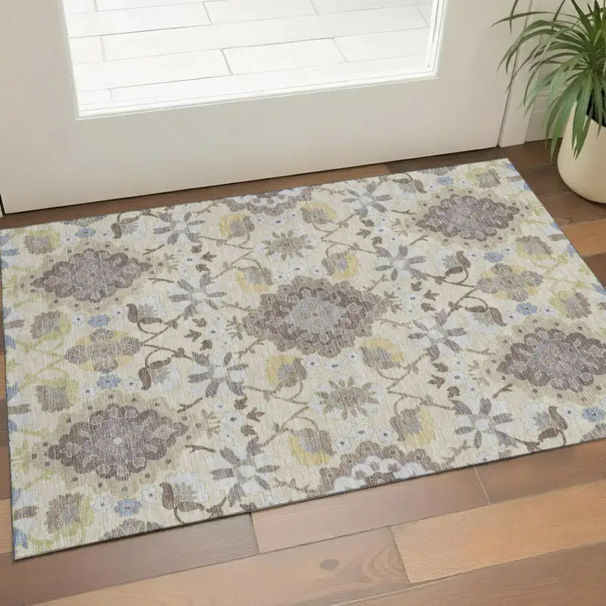 Ivory Gold And Beige Oriental Washable Area Rug With UV Protection Photo 1