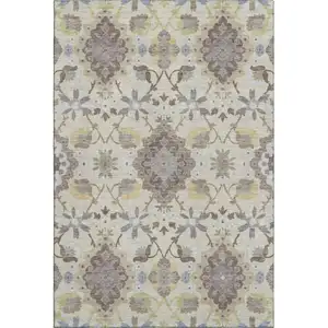 Photo of Ivory Gold And Beige Oriental Washable Area Rug With UV Protection