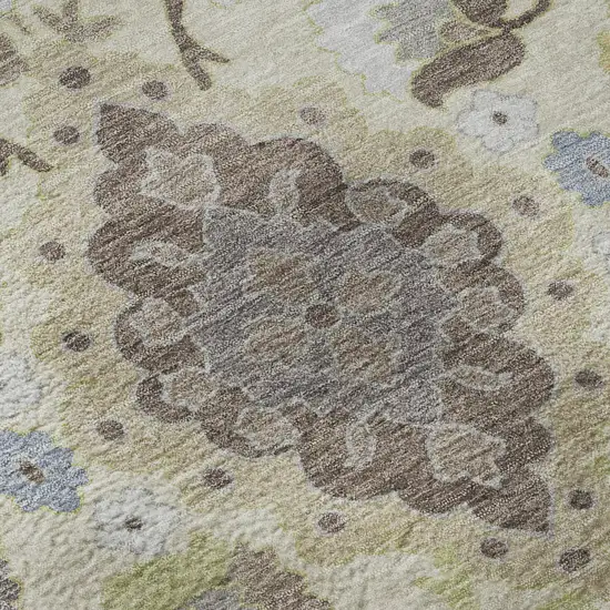Ivory Gold And Beige Oriental Washable Area Rug With UV Protection Photo 1