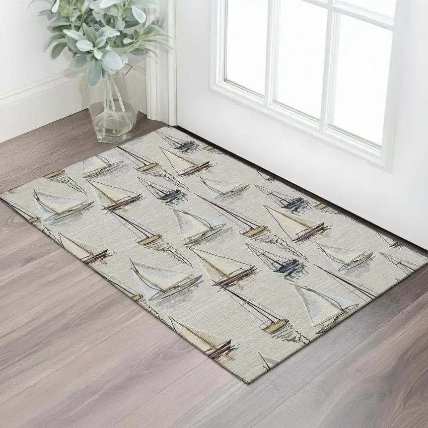 Ivory Gold And Black Nautical Washable Area Rug With UV Protection Photo 1