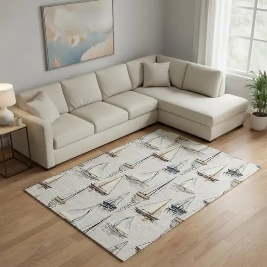 Ivory Gold And Black Nautical Washable Area Rug With UV Protection Photo 1