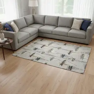 Photo of Ivory Gold And Black Nautical Washable Area Rug With UV Protection