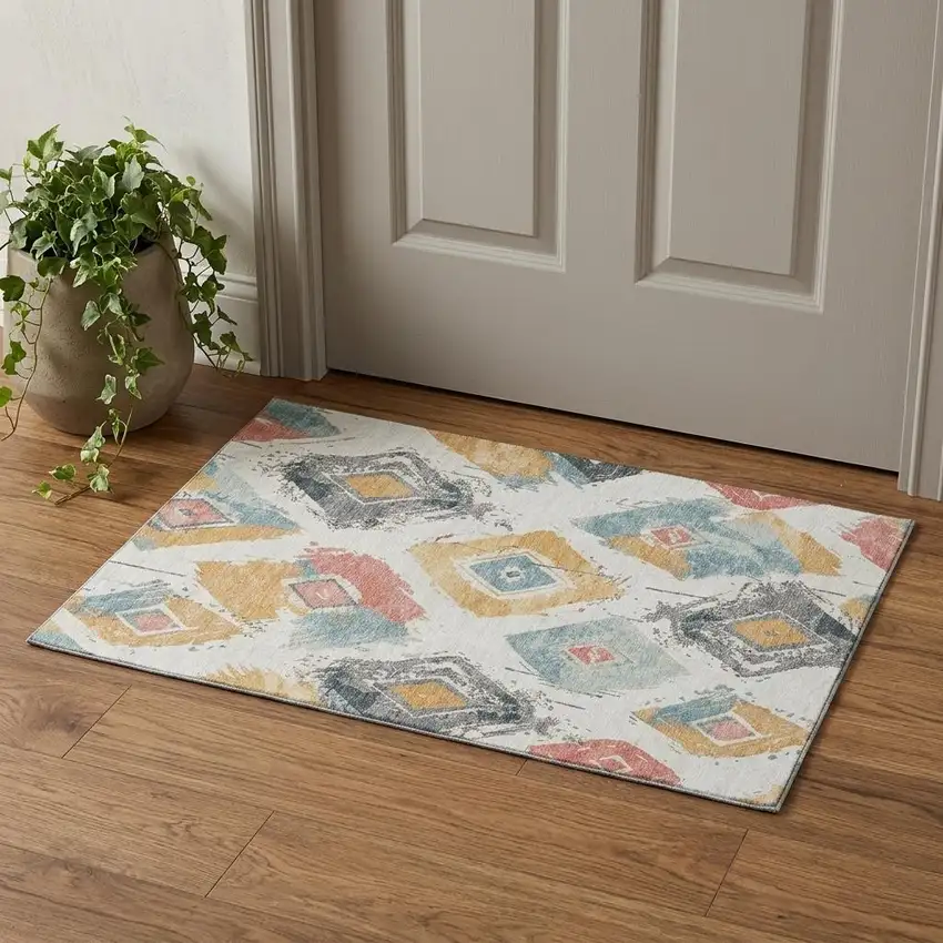 Ivory Gold And Blush Abstract Geometric Washable Area Rug With UV Protection Photo 1