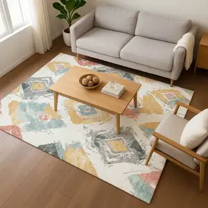 Photo of Ivory Gold And Blush Abstract Geometric Washable Area Rug With UV Protection