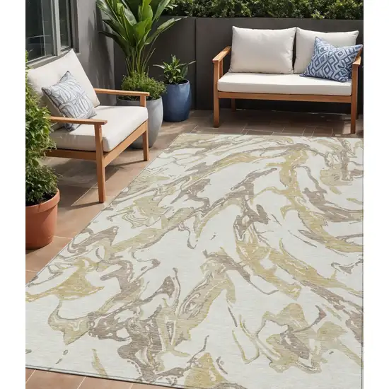 Ivory Gold And Brown Abstract Washable Indoor Outdoor Area Rug Photo 1