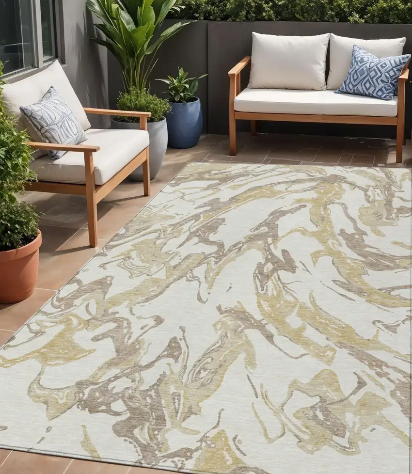 Ivory Gold And Brown Abstract Washable Indoor Outdoor Area Rug Photo 1