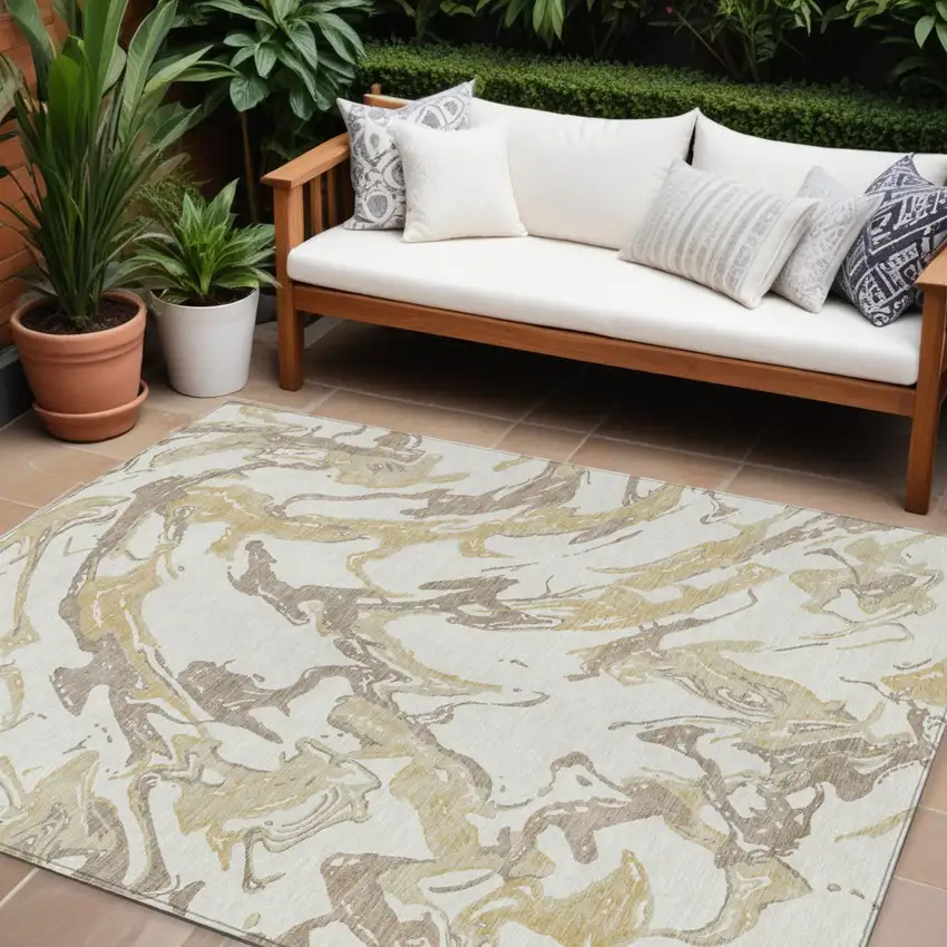 Ivory Gold And Brown Abstract Washable Indoor Outdoor Area Rug Photo 1