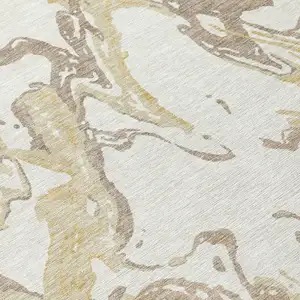 Photo of Ivory Gold And Brown Abstract Washable Indoor Outdoor Area Rug