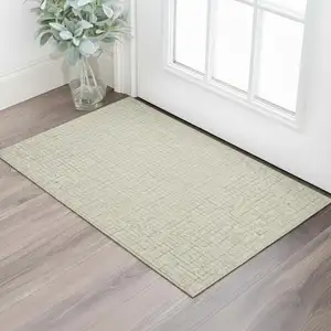 Photo of Ivory Gold And Gray Abstract Geometric Washable Area Rug