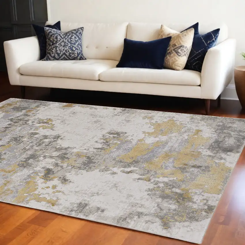 Ivory Gold And Gray Abstract Stain Resistant Area Rug Photo 1