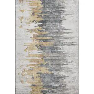 Photo of Ivory Gold And Gray Abstract Washable Area Rug With UV Protection