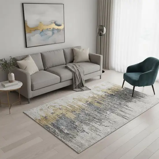 Ivory Gold And Gray Abstract Washable Area Rug With UV Protection Photo 1