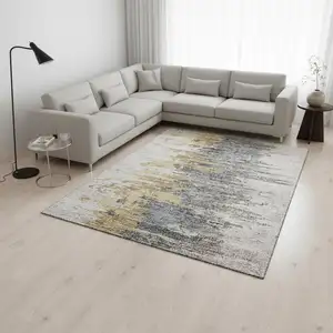 Photo of Ivory Gold And Gray Abstract Washable Area Rug With UV Protection