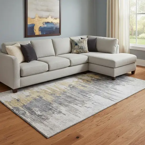 Ivory Gold And Gray Abstract Washable Area Rug With UV Protection Photo 1