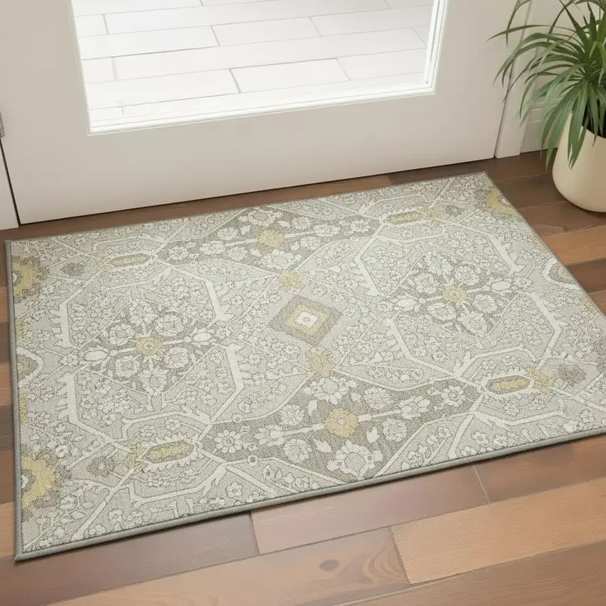Ivory Gold And Gray Floral Washable Area Rug With UV Protection Photo 1